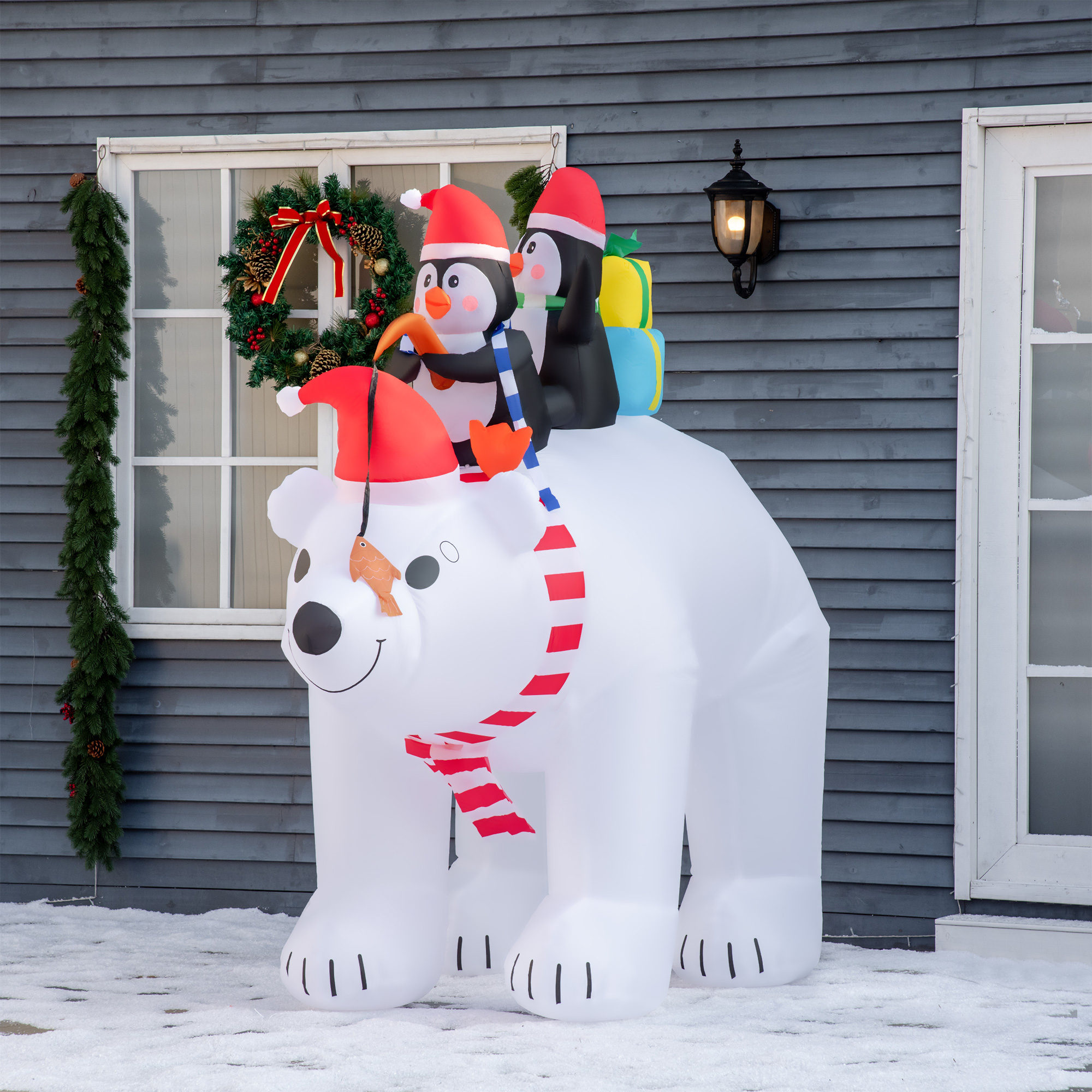 Piepūšamā Ziemassvētku dekorācija ar baltu lāci un diviem pingvīniem, ar LED apgaismojumu, balta, sarkana un melna, 227 × 113 × 206 cm