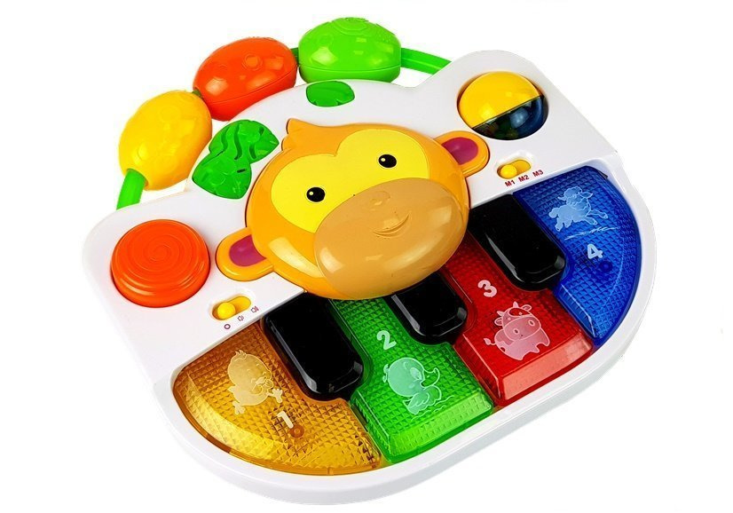 Pianinas su beždžione kūdikiui.