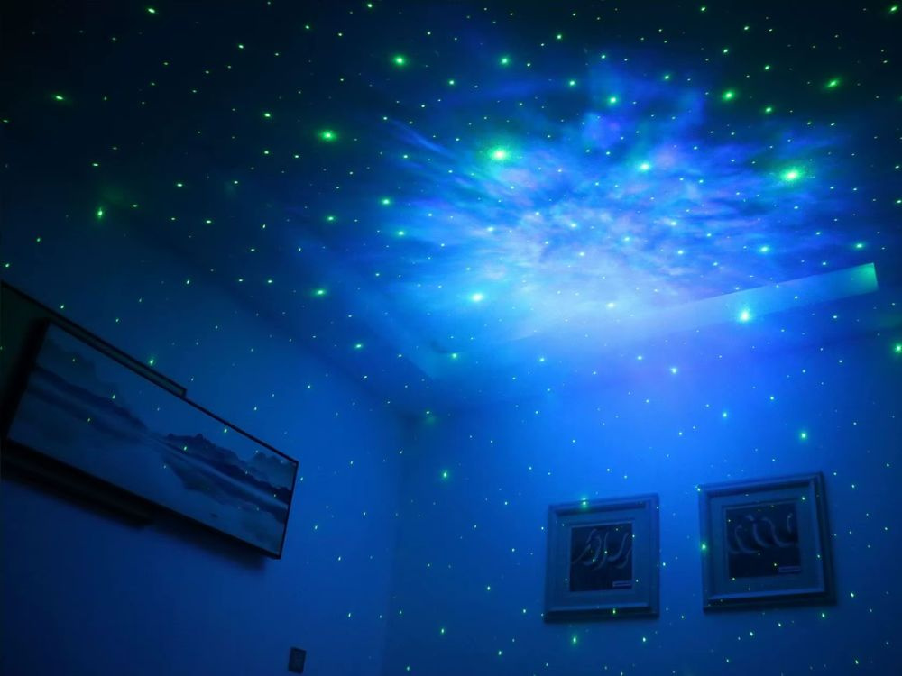 Žvaigždžių projektorius-astronautas su nuotoliniu valdymu