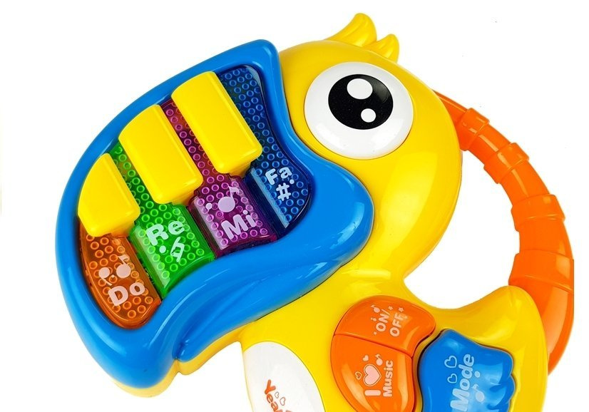 Geltonas papūgos formos pianinas mažyliams